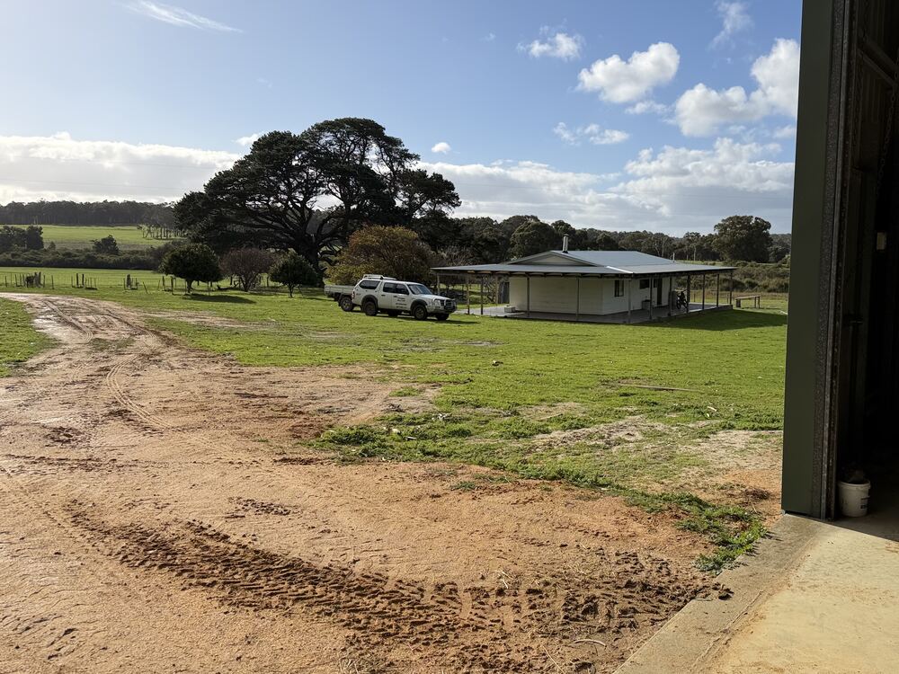 Farm shed looking across to the homestead near Margaret River — the two ends of a point-to-point wireless link